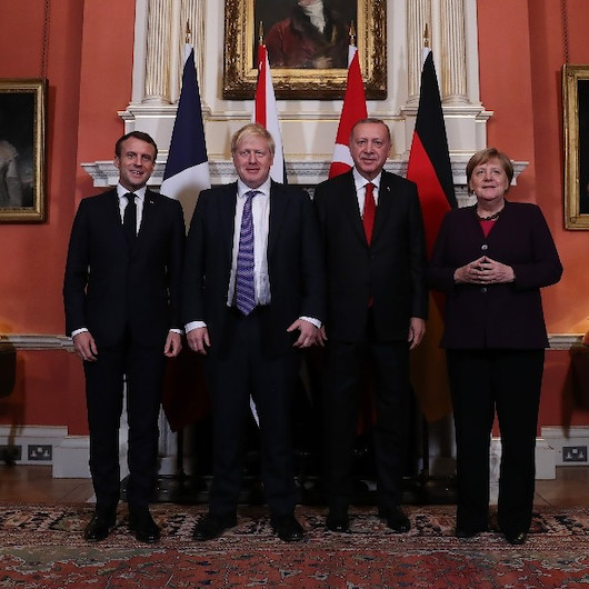 Erdoğan, Macron, Merkel ve Johnsonun bir araya geldiği ‘Dörtlü Zirve’den ilk fotoğraflar