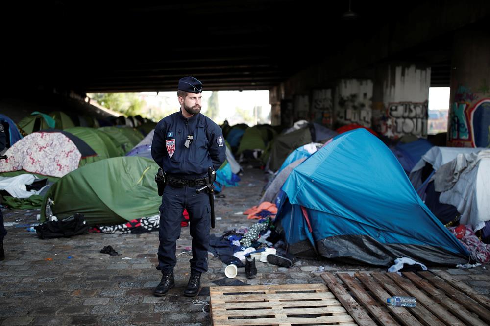 French police clear out Paris migrants camp