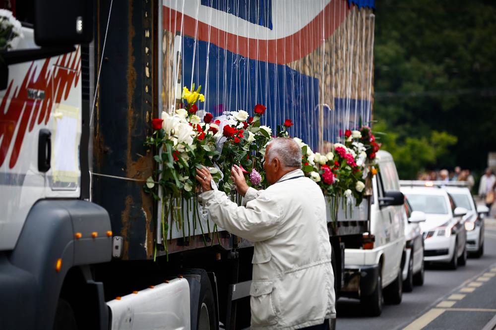 Bosnians honor Srebrenica victims with flowers and tears