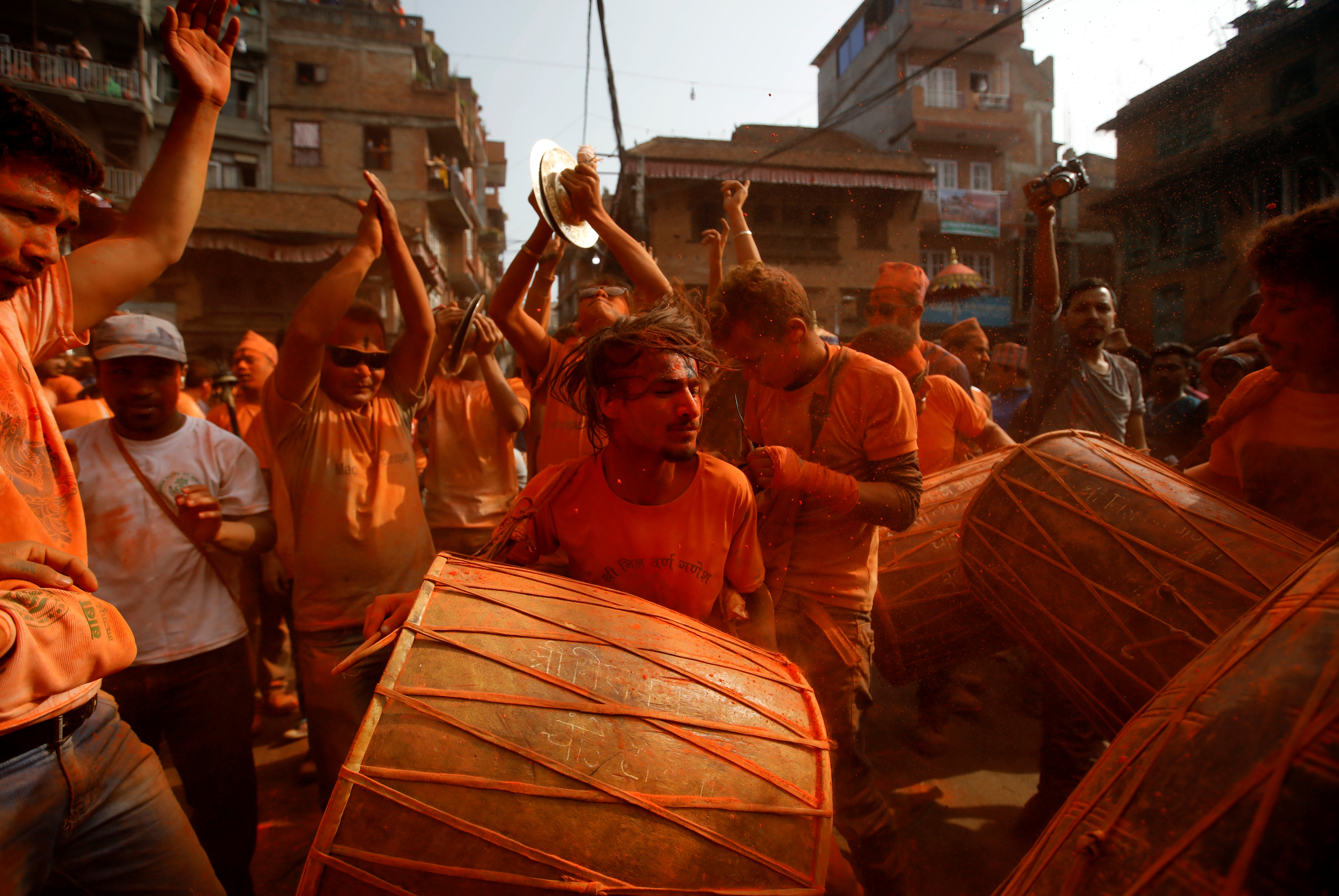 Devotees celebrate 'Sindoor Jatra' vermillion powder festival at Thimi
