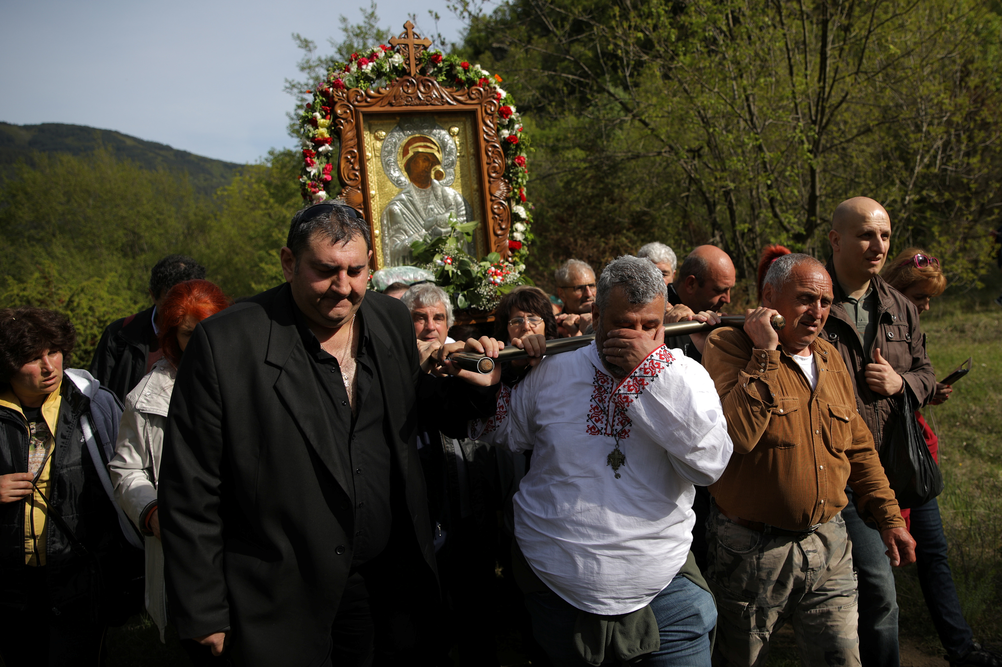 Orthodox Christians carry an icon of the Virgin Mary during a parade marking Easter near Bachkovo monastery