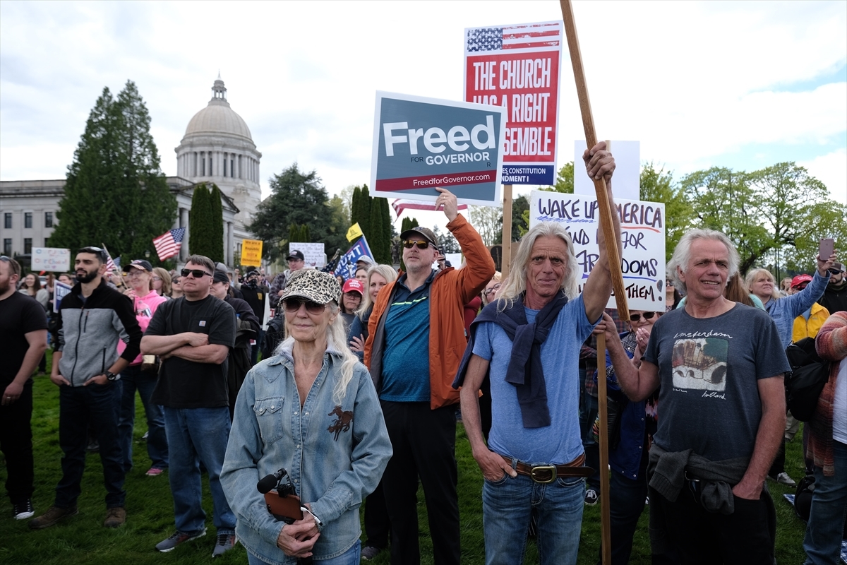 People demonstrate outside Washington State Capitol